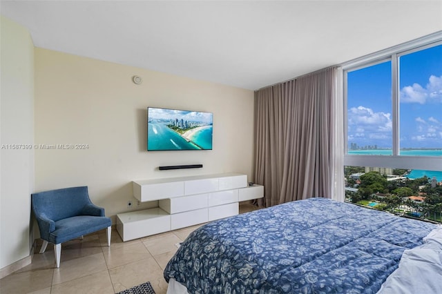 bedroom featuring light tile flooring