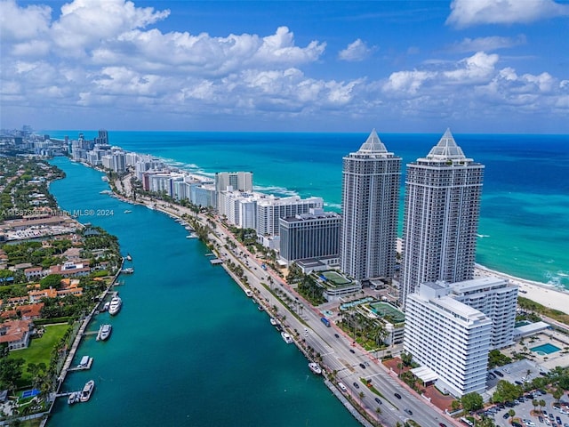 birds eye view of property featuring a water view