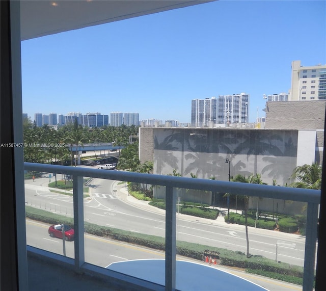 balcony featuring a city view