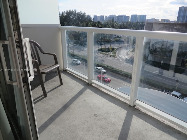 balcony featuring a view of city