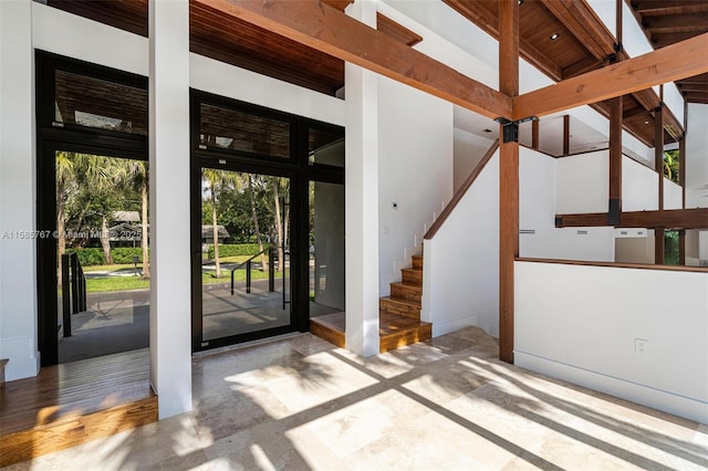 entrance to property featuring a patio