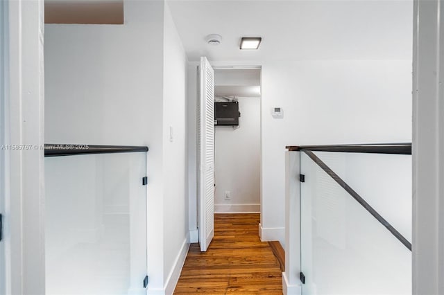 hallway featuring hardwood / wood-style flooring