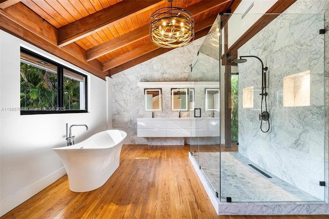 bathroom with hardwood / wood-style flooring, vanity, lofted ceiling with beams, plus walk in shower, and wooden ceiling