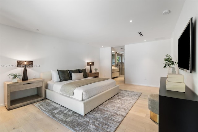 bedroom featuring light hardwood / wood-style floors