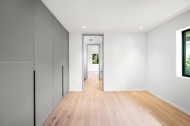 unfurnished bedroom with light hardwood / wood-style flooring