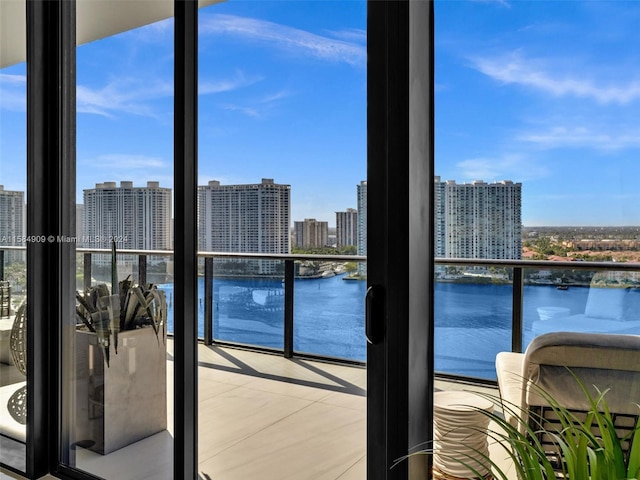 balcony featuring a water view