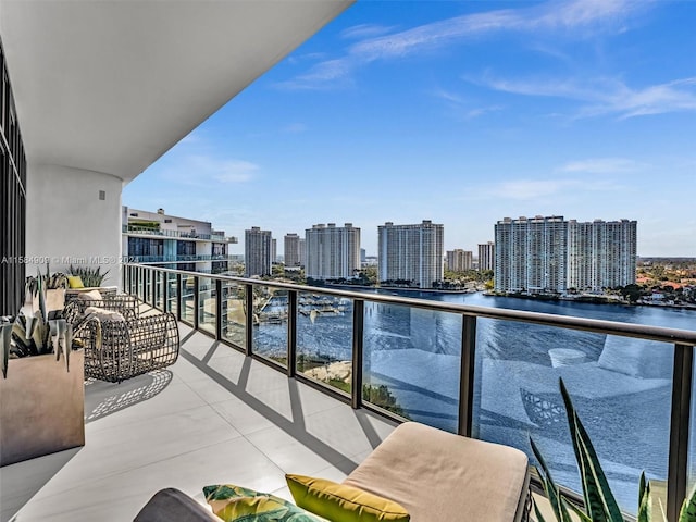 balcony featuring a water view