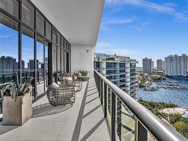 balcony featuring a water view