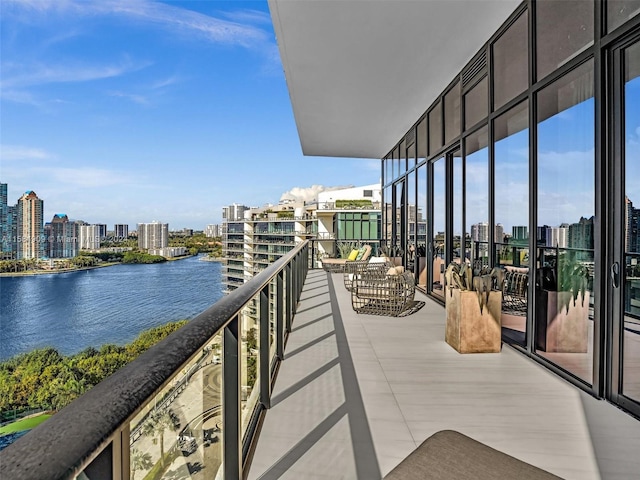 balcony featuring a water view