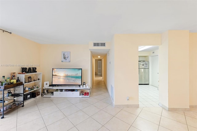 living room with light tile patterned floors