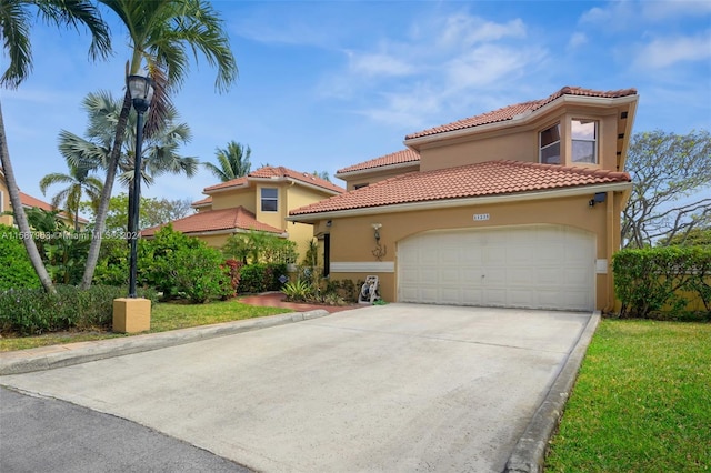 mediterranean / spanish-style home with a garage