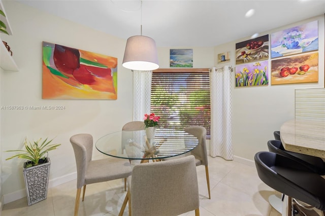 dining room with light tile floors