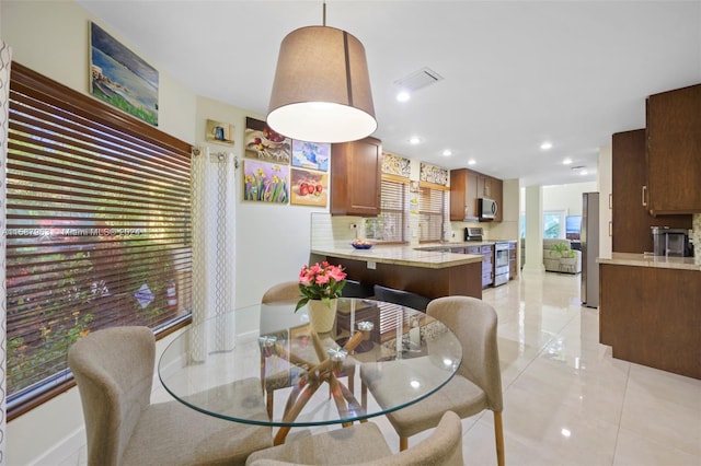 view of tiled dining area