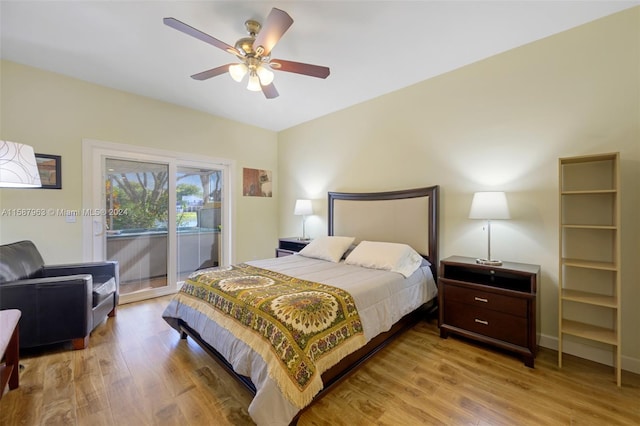 bedroom with access to outside, ceiling fan, and hardwood / wood-style floors