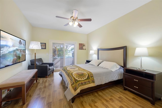 bedroom featuring ceiling fan, hardwood / wood-style flooring, and access to outside