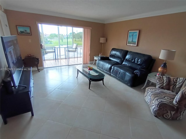 living room featuring crown molding and light tile patterned flooring