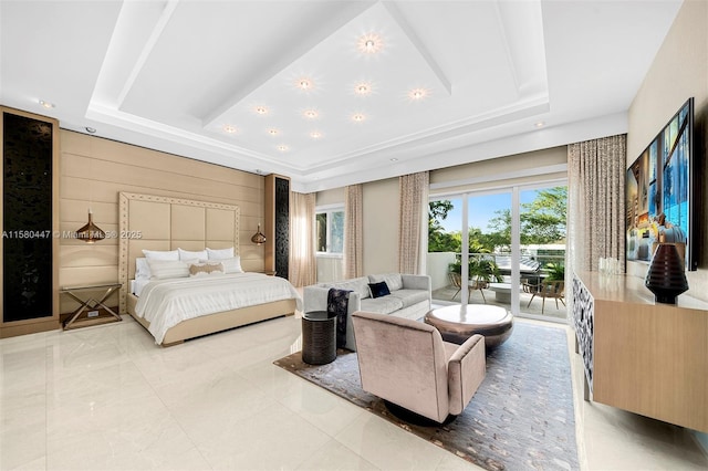 bedroom with wood walls, recessed lighting, a raised ceiling, and access to exterior