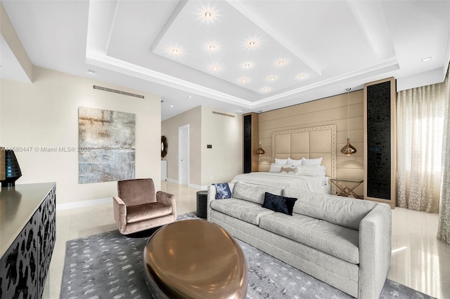 bedroom with recessed lighting, a raised ceiling, and baseboards