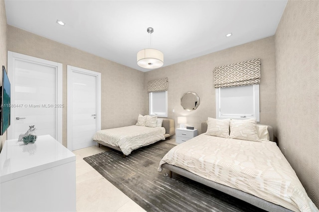 bedroom featuring tile patterned flooring