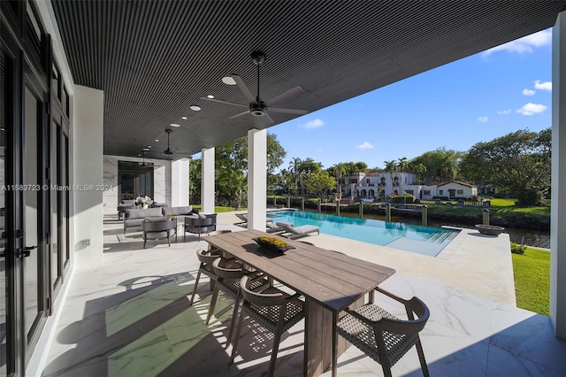 view of patio with ceiling fan and outdoor lounge area