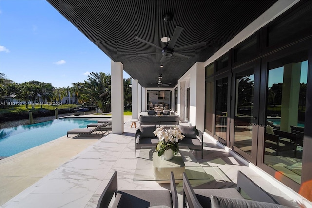 view of patio featuring ceiling fan, french doors, and an outdoor hangout area