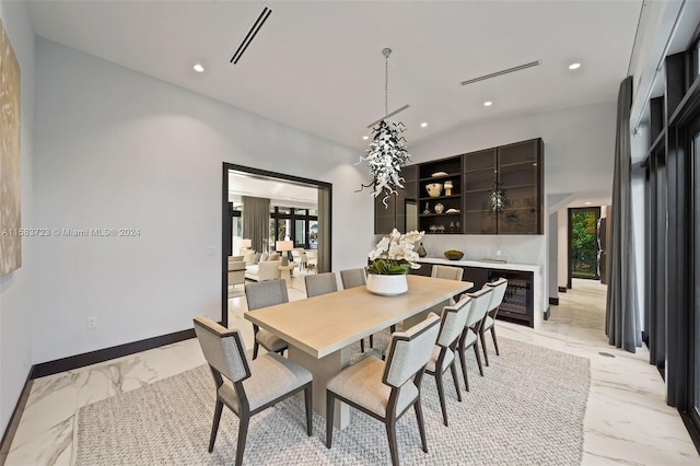 dining room featuring light tile flooring