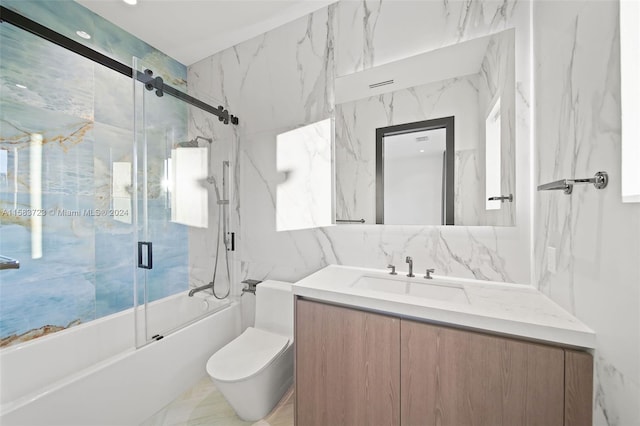 full bathroom featuring tile walls, enclosed tub / shower combo, toilet, tasteful backsplash, and vanity