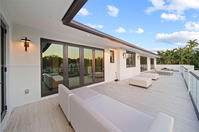 view of patio featuring a balcony