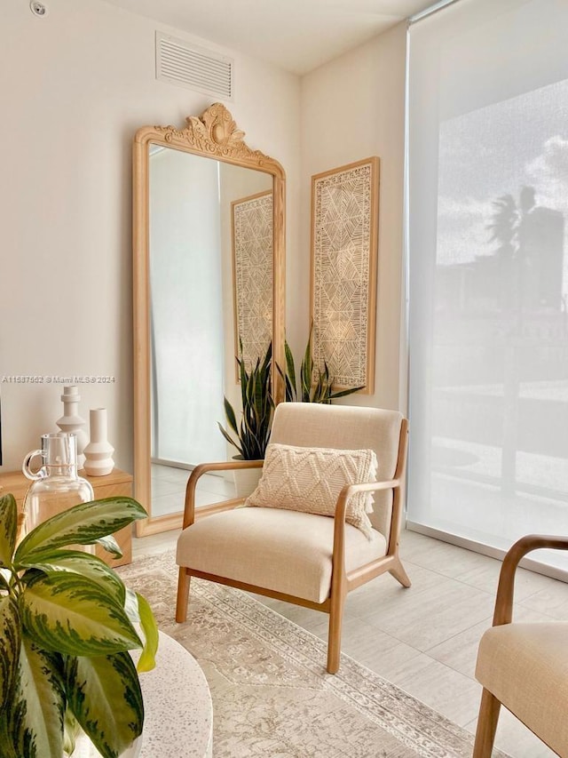 sitting room featuring tile flooring