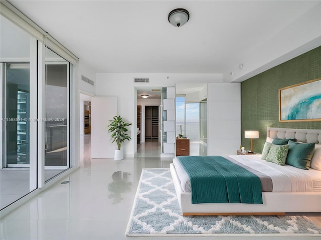 bedroom featuring tile patterned floors