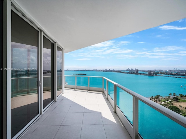 balcony featuring a water view