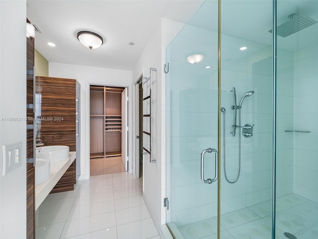 bathroom with vanity, tile patterned floors, and walk in shower