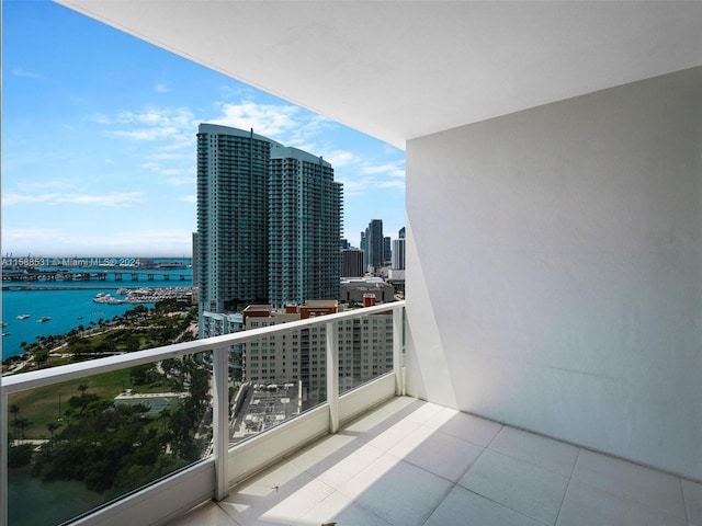 balcony featuring a water view