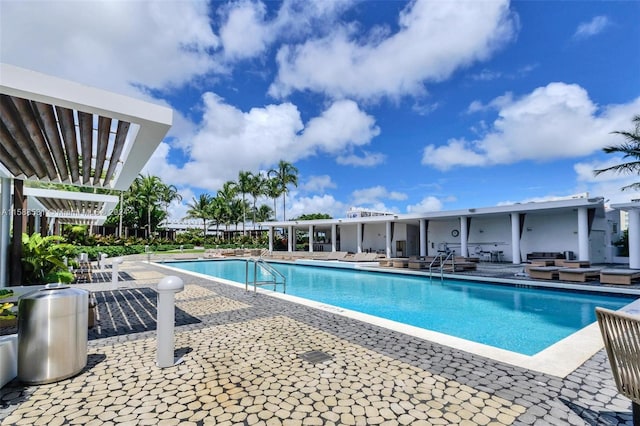 view of swimming pool featuring a patio area