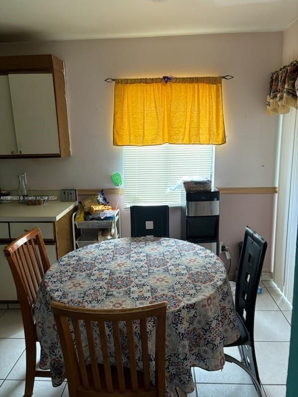 dining room featuring light tile patterned flooring