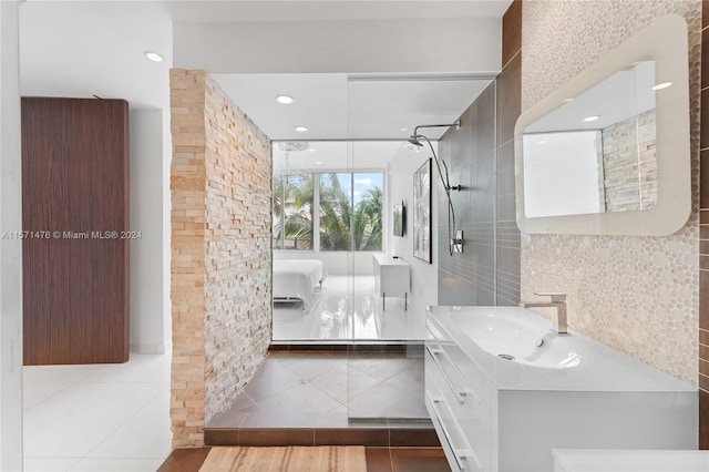 bathroom featuring tile floors and oversized vanity