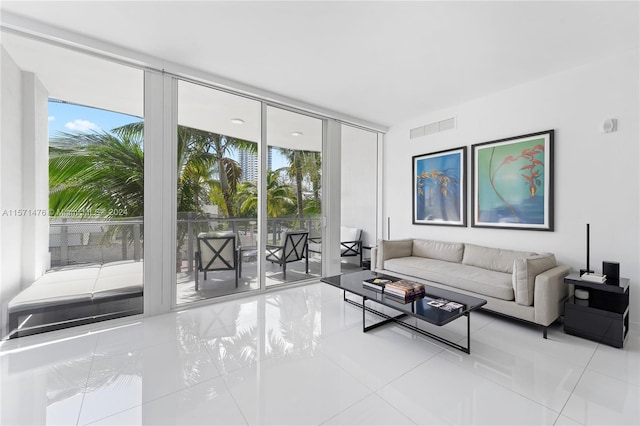 living room featuring light tile floors