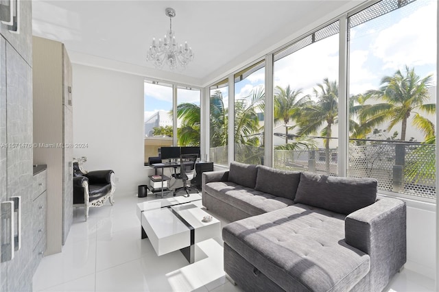 sunroom featuring a chandelier