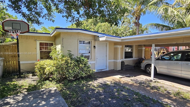 view of front facade with a carport