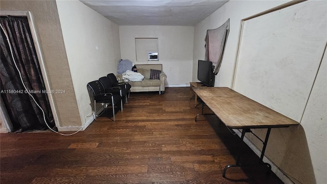 corridor featuring dark hardwood / wood-style floors