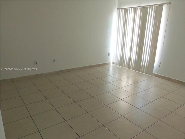 view of tiled spare room