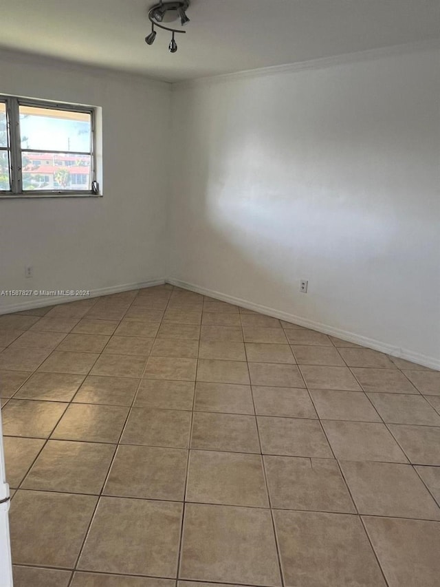 empty room with tile flooring