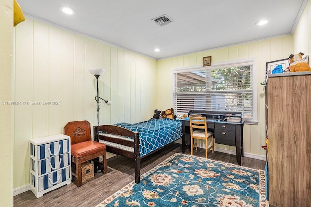 bedroom with wood-type flooring