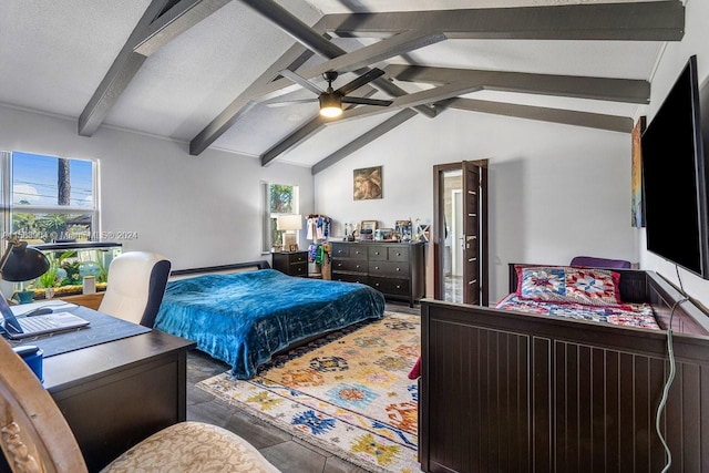 bedroom featuring lofted ceiling with beams, ceiling fan, multiple windows, and a textured ceiling