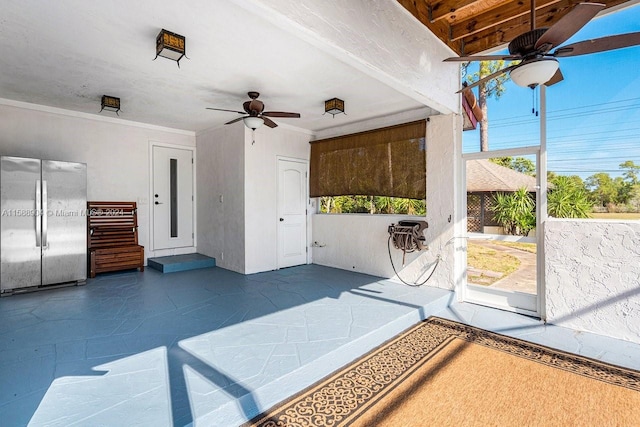 view of patio / terrace with ceiling fan