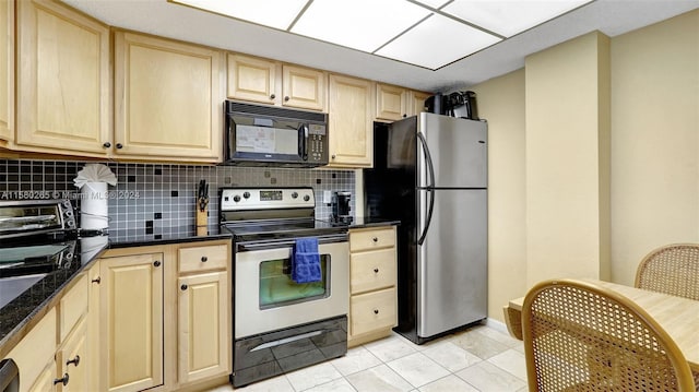 kitchen with tasteful backsplash, light brown cabinets, light tile patterned flooring, and stainless steel appliances