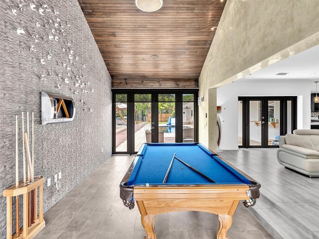 rec room with high vaulted ceiling, french doors, wooden ceiling, and billiards