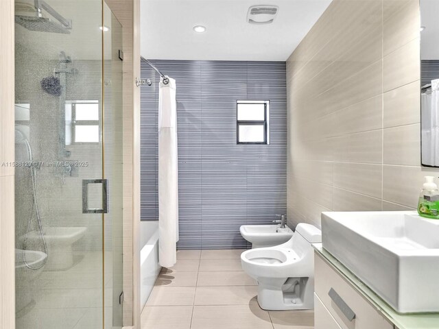 full bathroom with plus walk in shower, a bidet, tile walls, and tile patterned floors