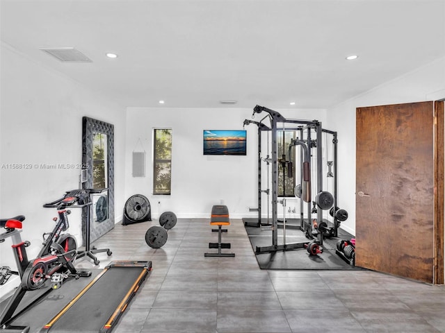 workout area featuring baseboards, visible vents, and recessed lighting