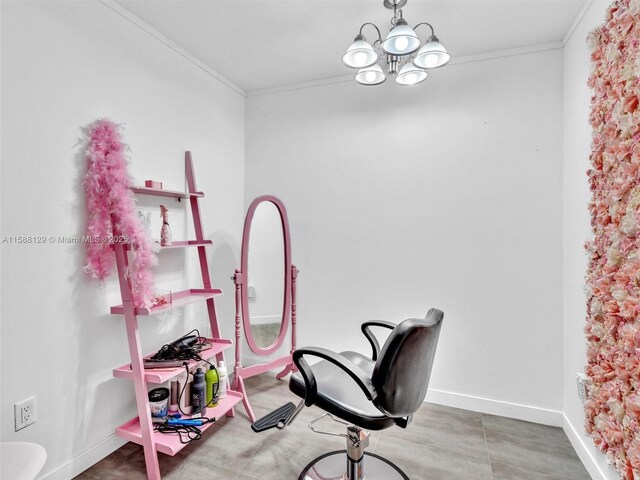 office space with an inviting chandelier and ornamental molding